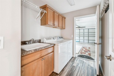 Beautifully maintained 3-bedroom, 2-bath Designer Home with a on Bella Glade Country Club in Florida - for sale on GolfHomes.com, golf home, golf lot