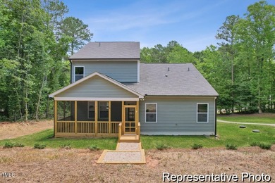 This semi-custom home in Lake Royale offers 3BR/2.5BA and 2,098 on River Golf and County Club at Lake Royale in North Carolina - for sale on GolfHomes.com, golf home, golf lot