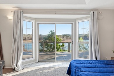 Furnished lakefront home with stunning views and a gentle walk on  in Arkansas - for sale on GolfHomes.com, golf home, golf lot