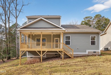 This semi-custom home in Lake Royale offers 3BR/2.5BA and 2,098 on River Golf and County Club at Lake Royale in North Carolina - for sale on GolfHomes.com, golf home, golf lot