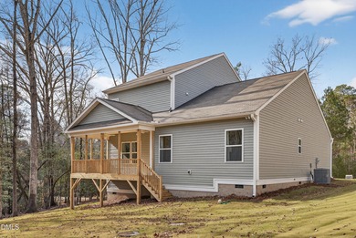 This semi-custom home in Lake Royale offers 3BR/2.5BA and 2,098 on River Golf and County Club at Lake Royale in North Carolina - for sale on GolfHomes.com, golf home, golf lot