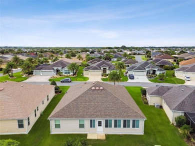 Beautifully maintained 3-bedroom, 2-bath Designer Home with a on Bella Glade Country Club in Florida - for sale on GolfHomes.com, golf home, golf lot