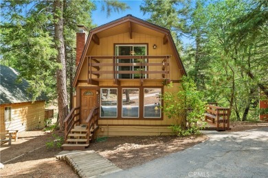 Welcome to this charming 2-story Moonridge cabin, perfectly on Big Bear Mountain Ski and Golf Resort in California - for sale on GolfHomes.com, golf home, golf lot