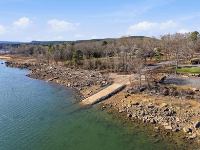 Furnished lakefront home with stunning views and a gentle walk on  in Arkansas - for sale on GolfHomes.com, golf home, golf lot