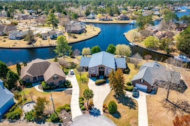 Experience unparalleled waterfront living in this extraordinary on Harbour Point Golf Club in North Carolina - for sale on GolfHomes.com, golf home, golf lot