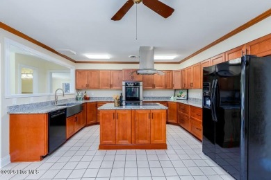 Experience unparalleled waterfront living in this extraordinary on Harbour Point Golf Club in North Carolina - for sale on GolfHomes.com, golf home, golf lot