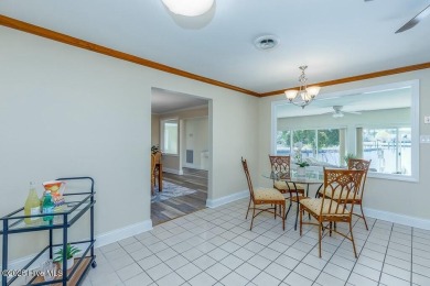 Experience unparalleled waterfront living in this extraordinary on Harbour Point Golf Club in North Carolina - for sale on GolfHomes.com, golf home, golf lot