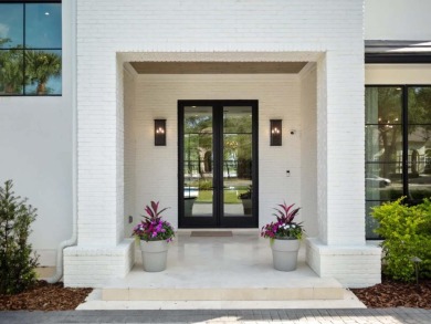 Nestled along the 12th fairway of Lake Nona's famed championship on Lake Nona Golf Club, Inc. in Florida - for sale on GolfHomes.com, golf home, golf lot