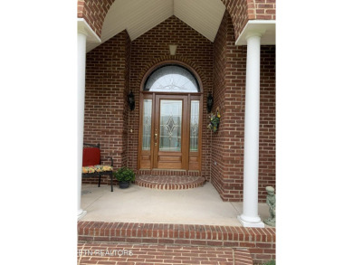 This tastefully appointed all brick home 3/2.5/3 spans over 3 on Deer Creek Golf Club in Tennessee - for sale on GolfHomes.com, golf home, golf lot