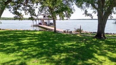 This iconic Star Harbor home sits on one of the largest and most on Star Harbor Golf Club in Texas - for sale on GolfHomes.com, golf home, golf lot