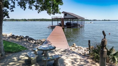 This iconic Star Harbor home sits on one of the largest and most on Star Harbor Golf Club in Texas - for sale on GolfHomes.com, golf home, golf lot
