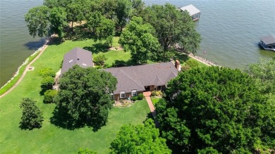 This iconic Star Harbor home sits on one of the largest and most on Star Harbor Golf Club in Texas - for sale on GolfHomes.com, golf home, golf lot