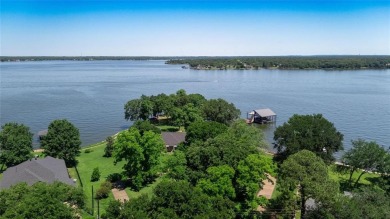 This iconic Star Harbor home sits on one of the largest and most on Star Harbor Golf Club in Texas - for sale on GolfHomes.com, golf home, golf lot