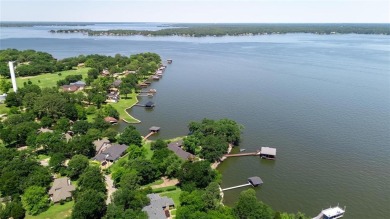 This iconic Star Harbor home sits on one of the largest and most on Star Harbor Golf Club in Texas - for sale on GolfHomes.com, golf home, golf lot