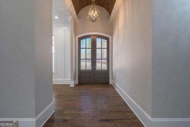 New Construction in Reynolds Lake Oconee! Located Between Hole on Reynolds Lake Oconee - The Oconee in Georgia - for sale on GolfHomes.com, golf home, golf lot
