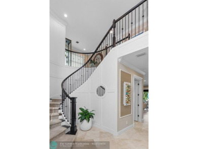 Experience resort style living in this lakefront Parkland Golf & on Parkland Golf Club in Florida - for sale on GolfHomes.com, golf home, golf lot
