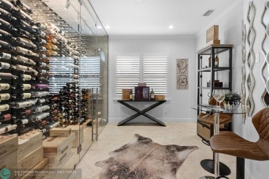 Experience resort style living in this lakefront Parkland Golf & on Parkland Golf Club in Florida - for sale on GolfHomes.com, golf home, golf lot