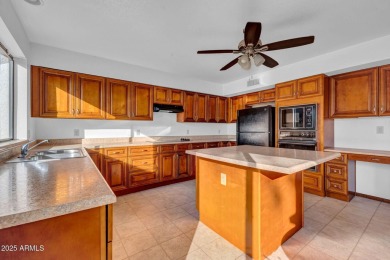 Located in a cozy 12-home community, this 3-bedroom, 2-bathroom on Mesa Country Club in Arizona - for sale on GolfHomes.com, golf home, golf lot