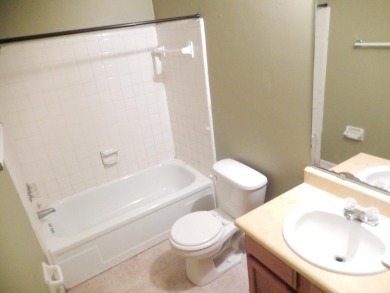 LOVELY Occupied SE Duplex w/ Carports, Fenced Yards, & Storage on Hilaman Park Golf Course in Florida - for sale on GolfHomes.com, golf home, golf lot