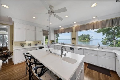 Discover timeless charm and breathtaking views at 318 Lands End on Timberlake Country Club in South Carolina - for sale on GolfHomes.com, golf home, golf lot