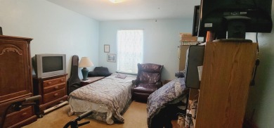 LOVELY Occupied SE Duplex w/ Carports, Fenced Yards, & Storage on Hilaman Park Golf Course in Florida - for sale on GolfHomes.com, golf home, golf lot