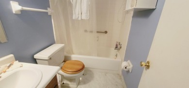 LOVELY Occupied SE Duplex w/ Carports, Fenced Yards, & Storage on Hilaman Park Golf Course in Florida - for sale on GolfHomes.com, golf home, golf lot