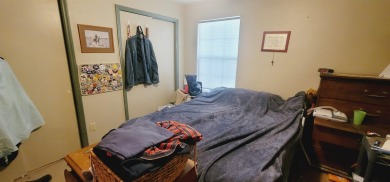 LOVELY Occupied SE Duplex w/ Carports, Fenced Yards, & Storage on Hilaman Park Golf Course in Florida - for sale on GolfHomes.com, golf home, golf lot