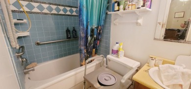 LOVELY Occupied SE Duplex w/ Carports, Fenced Yards, & Storage on Hilaman Park Golf Course in Florida - for sale on GolfHomes.com, golf home, golf lot