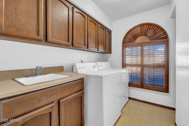 Located in a cozy 12-home community, this 3-bedroom, 2-bathroom on Mesa Country Club in Arizona - for sale on GolfHomes.com, golf home, golf lot