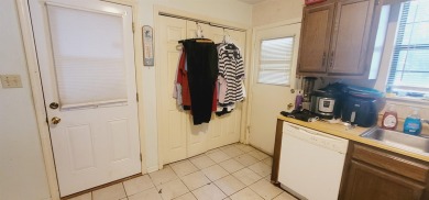 LOVELY Occupied SE Duplex w/ Carports, Fenced Yards, & Storage on Hilaman Park Golf Course in Florida - for sale on GolfHomes.com, golf home, golf lot