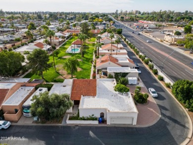 Located in a cozy 12-home community, this 3-bedroom, 2-bathroom on Mesa Country Club in Arizona - for sale on GolfHomes.com, golf home, golf lot