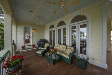 Discover timeless charm and breathtaking views at 318 Lands End on Timberlake Country Club in South Carolina - for sale on GolfHomes.com, golf home, golf lot