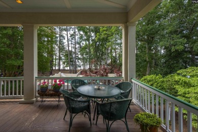 Discover timeless charm and breathtaking views at 318 Lands End on Timberlake Country Club in South Carolina - for sale on GolfHomes.com, golf home, golf lot