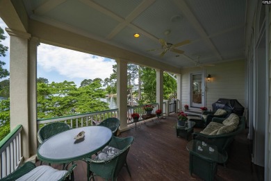 Discover timeless charm and breathtaking views at 318 Lands End on Timberlake Country Club in South Carolina - for sale on GolfHomes.com, golf home, golf lot