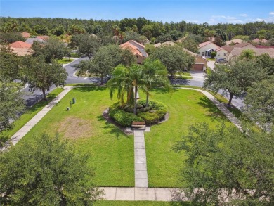 Stunning MOVE-IN-READY Allegro model situated on a desirable on Stonegate Golf Club in Florida - for sale on GolfHomes.com, golf home, golf lot