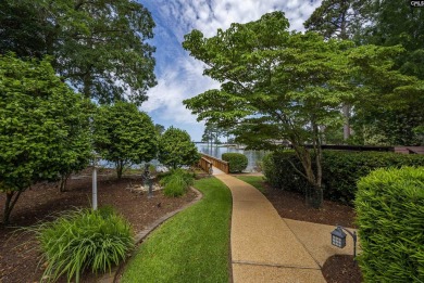 Discover timeless charm and breathtaking views at 318 Lands End on Timberlake Country Club in South Carolina - for sale on GolfHomes.com, golf home, golf lot