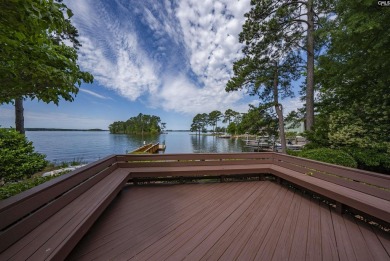 Discover timeless charm and breathtaking views at 318 Lands End on Timberlake Country Club in South Carolina - for sale on GolfHomes.com, golf home, golf lot