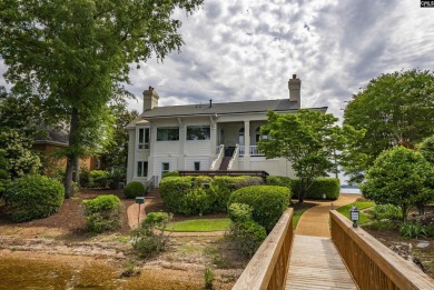 Discover timeless charm and breathtaking views at 318 Lands End on Timberlake Country Club in South Carolina - for sale on GolfHomes.com, golf home, golf lot