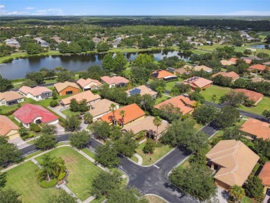 Stunning MOVE-IN-READY Allegro model situated on a desirable on Stonegate Golf Club in Florida - for sale on GolfHomes.com, golf home, golf lot