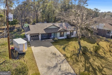 Welcome home to this lovely 4 bedroom, 2 bath ranch with 1,862 on Cherokee Rose Country Club in Georgia - for sale on GolfHomes.com, golf home, golf lot