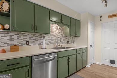 Welcome home to this lovely 4 bedroom, 2 bath ranch with 1,862 on Cherokee Rose Country Club in Georgia - for sale on GolfHomes.com, golf home, golf lot