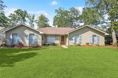 Beautifully updated home on the golf course in the gated on Beau Chene Country Club in Louisiana - for sale on GolfHomes.com, golf home, golf lot