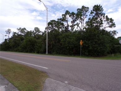 This Oversized corner lot is 1/3 acre and would be a great place on Saint Andrews South Golf Club in Florida - for sale on GolfHomes.com, golf home, golf lot