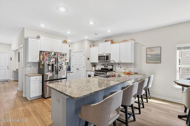 Located in the highly desirable Beach Walk community and just a on Oyster Bay Golf Links in North Carolina - for sale on GolfHomes.com, golf home, golf lot