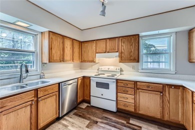 Nestled just steps from beloved Como Park, this sweet and on Como Golf Course in Minnesota - for sale on GolfHomes.com, golf home, golf lot