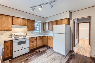 Nestled just steps from beloved Como Park, this sweet and on Como Golf Course in Minnesota - for sale on GolfHomes.com, golf home, golf lot
