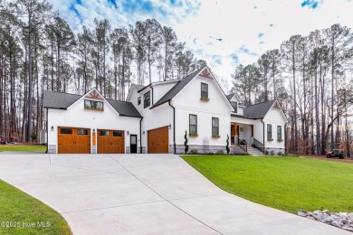 Welcome to this stunning & charming farmhouse-style home on River Golf and County Club at Lake Royale in North Carolina - for sale on GolfHomes.com, golf home, golf lot