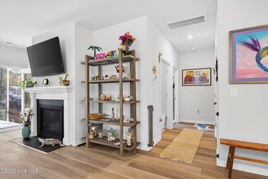 Located in the highly desirable Beach Walk community and just a on Oyster Bay Golf Links in North Carolina - for sale on GolfHomes.com, golf home, golf lot