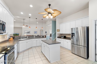 Welcome to 7401 Balmore Drive SW- your next primary residence or on Sandpiper Bay Golf and Country Club in North Carolina - for sale on GolfHomes.com, golf home, golf lot