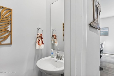 Located in the highly desirable Beach Walk community and just a on Oyster Bay Golf Links in North Carolina - for sale on GolfHomes.com, golf home, golf lot